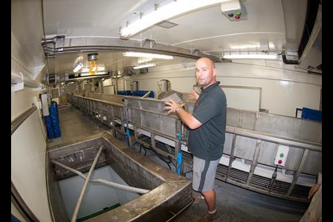 Captain Laurent shows one of the storage holds that the frozen tuna are lowered into. Credit: Haig-Brown photos courtesy of Cummins